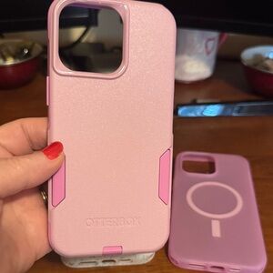 OtterBox Pink 15 pro max iphone Cases, two other 1 white and 1 pink